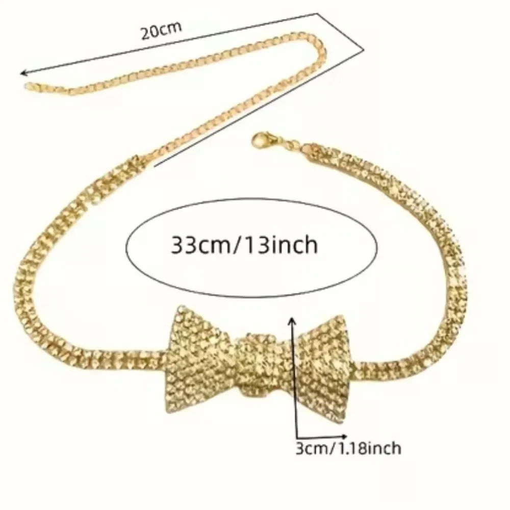 Dazzling crystal bow centerpiece on a sparkling choker. Elegant, eye-catching.